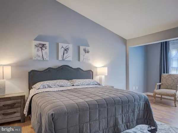 a bathroom with a sink a mirror and a vanity