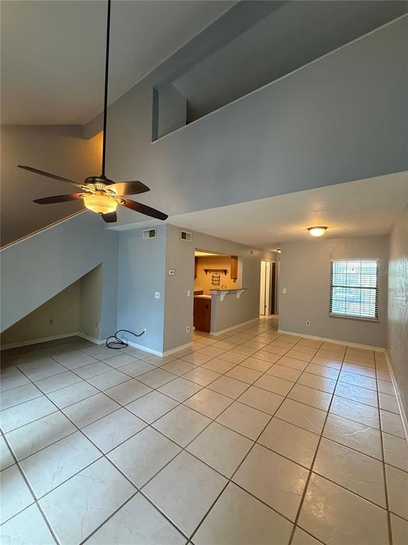 7200 Southwest 8th Avenue, Unit T128 Gainesville, FL 32607 - Photo 3 of 38 a view of a room with window and stairs