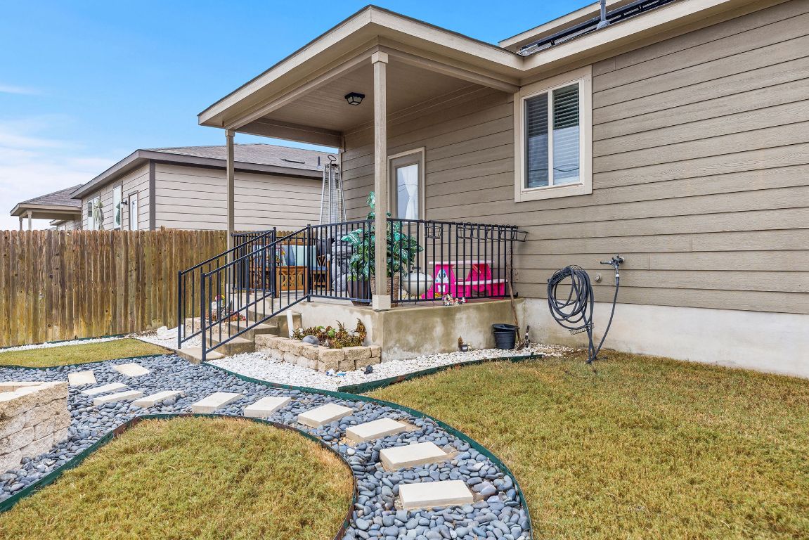 209 Ibis Falls Loop Jarrell, TX 76537 - Photo 35 of 40 a front view of house with outdoor seating