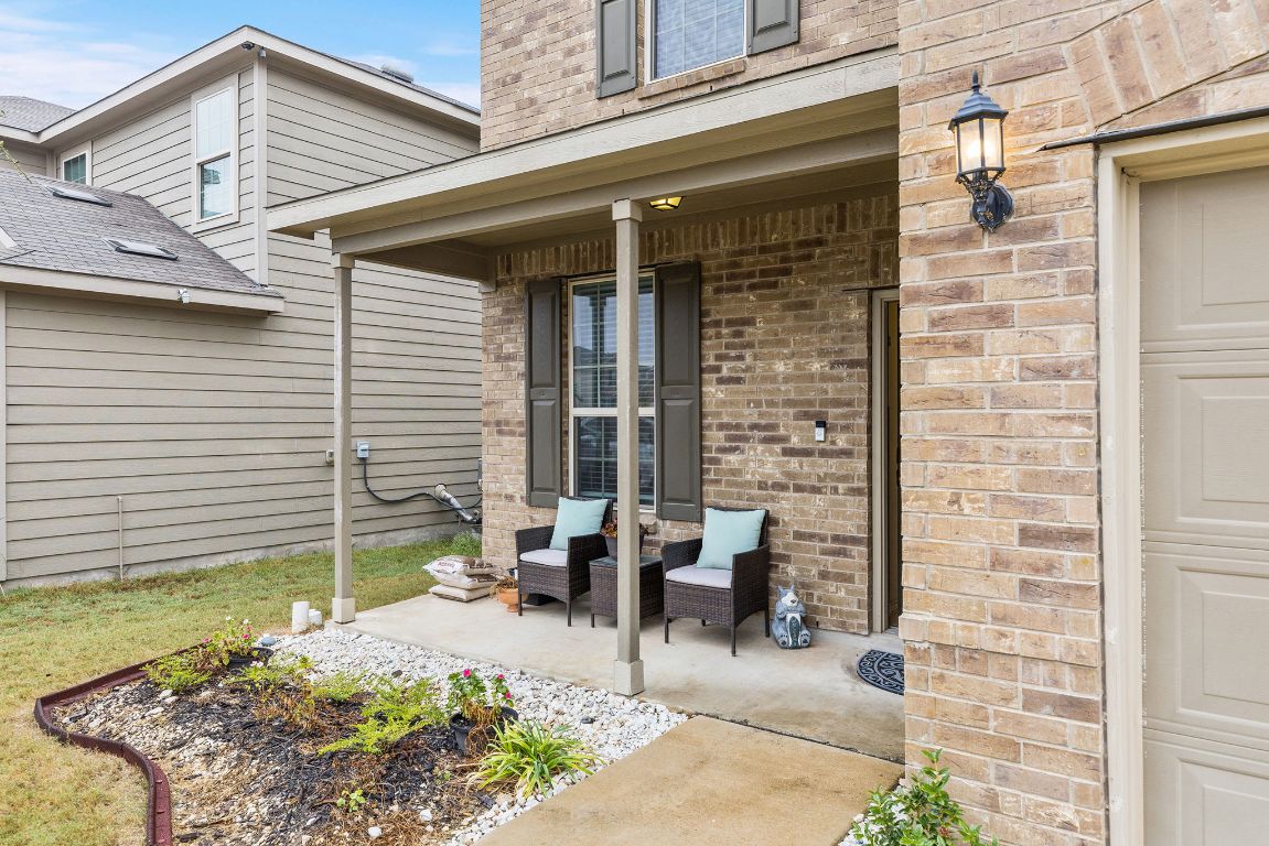 209 Ibis Falls Loop Jarrell, TX 76537 - Photo 38 of 40 a backyard of a house with seating space