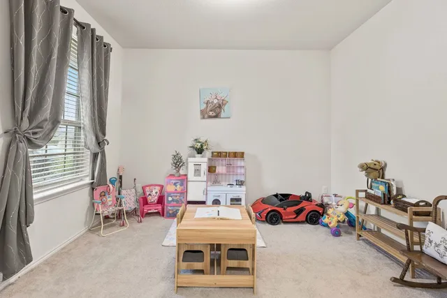 a room with furniture and window