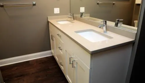 a bathroom with a sink and a mirror