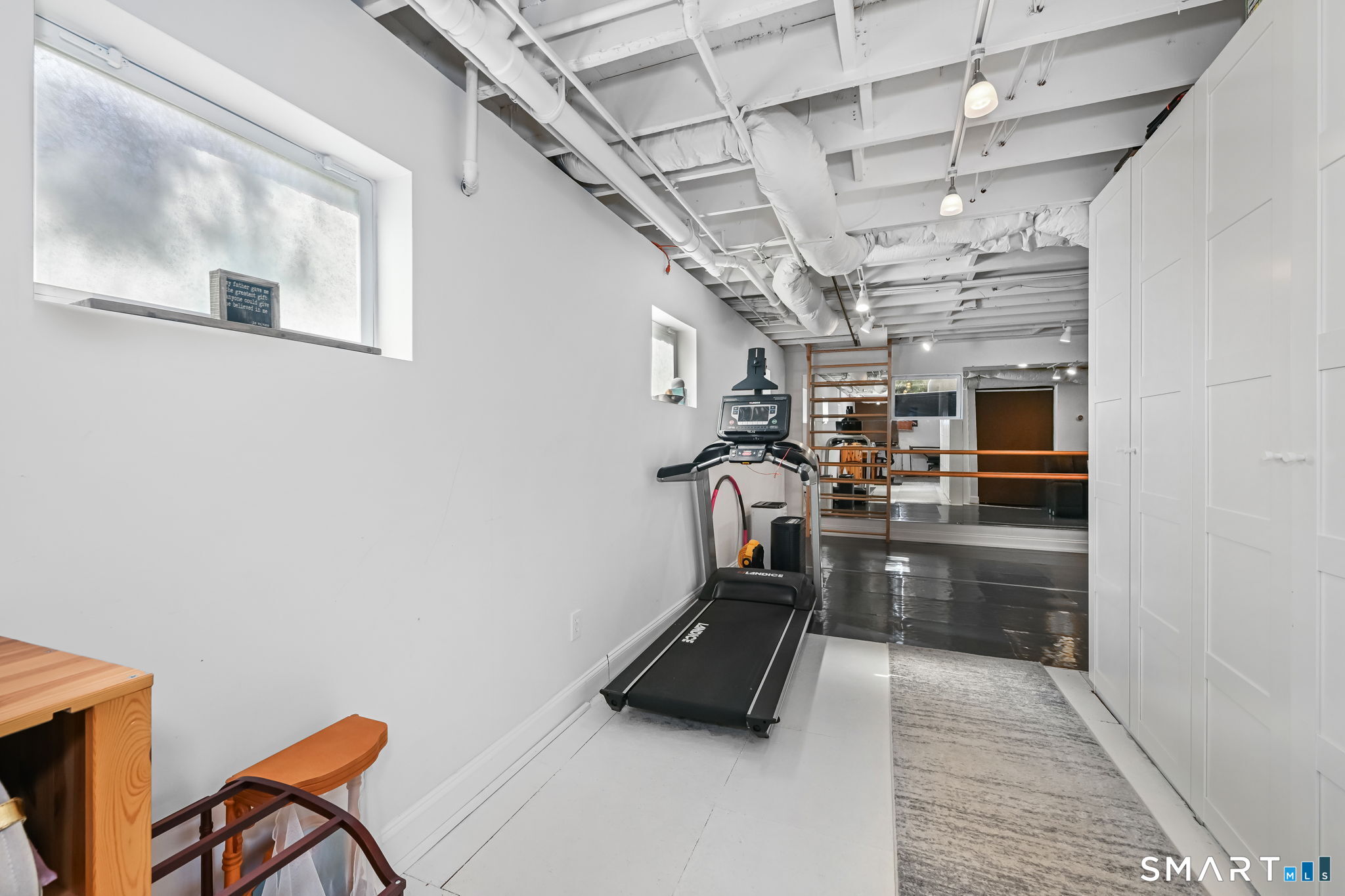 50 Berkeley Road Fairfield, CT 06825 - Photo 26 of 36 Lower level also has exercise space!