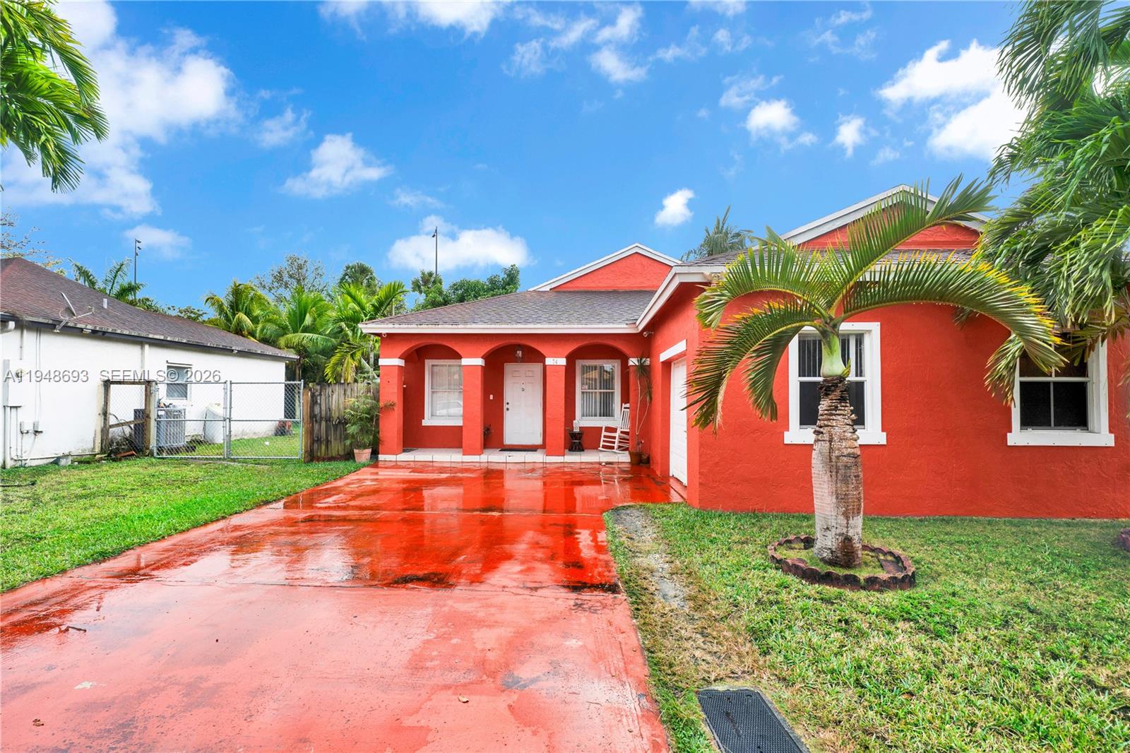 74 Northwest 2nd Street Homestead, FL 33030 - Photo 2 of 41 a front view of house with yard and green space