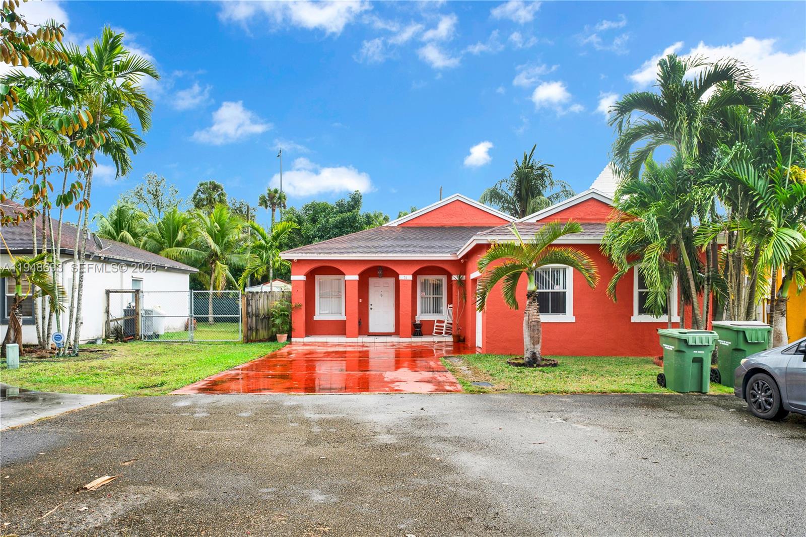 74 Northwest 2nd Street Homestead, FL 33030 - Photo 3 of 41 a front view of house with yard and green space