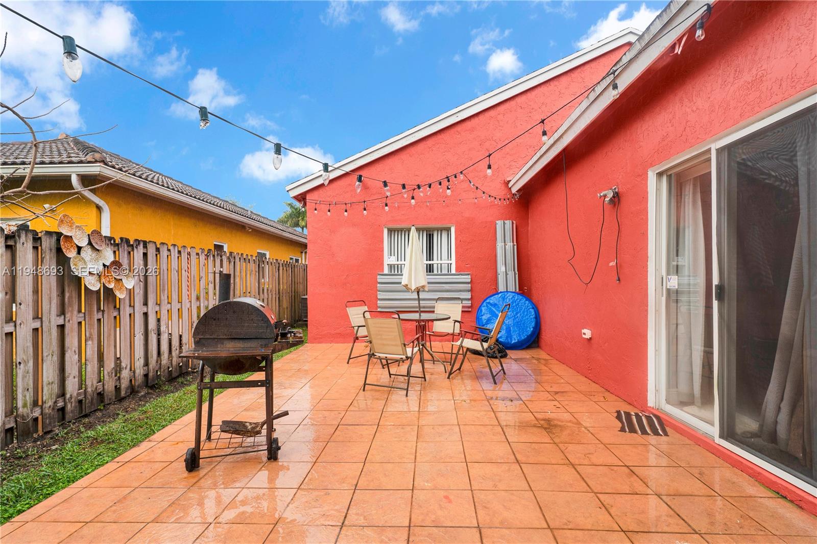 74 Northwest 2nd Street Homestead, FL 33030 - Photo 32 of 41 a outdoor space with chairs