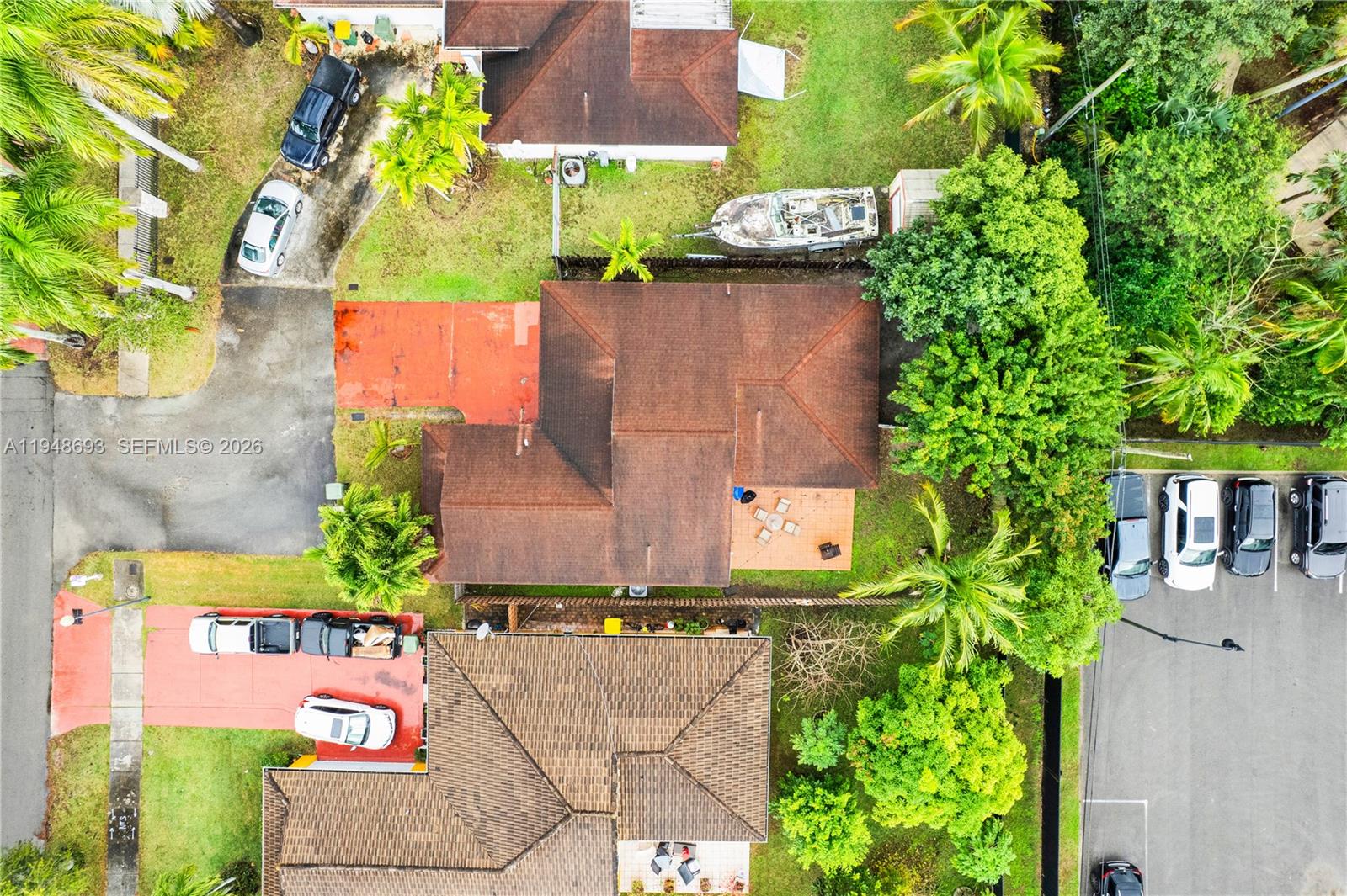 74 Northwest 2nd Street Homestead, FL 33030 - Photo 5 of 41 an aerial view of a house with a yard and garden