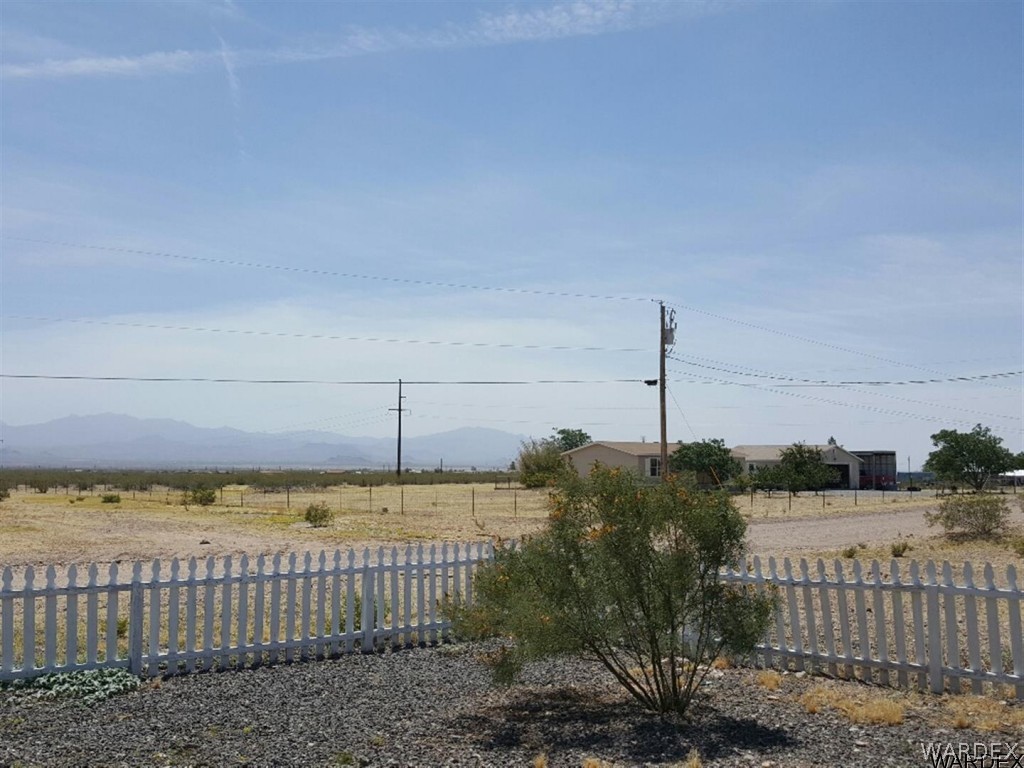 1097 South Concho Road Golden Valley, AZ 86413 - Photo 14 of 20 a view of a green field