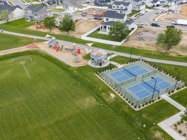 646 South Meade Street Mapleton, UT 84664 - Photo 39 of 46 Expansive green field featuring a playground, two pickleball courts, a gazebo, and walking paths