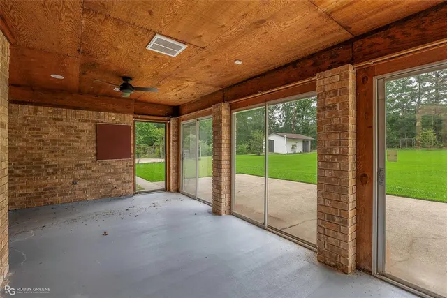 a view of an entryway with a garden
