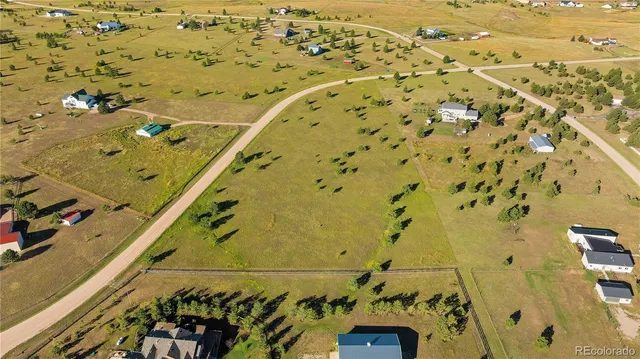 a view of an ocean with a mountain