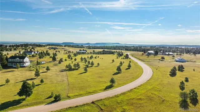 a view of a swimming pool with an ocean view