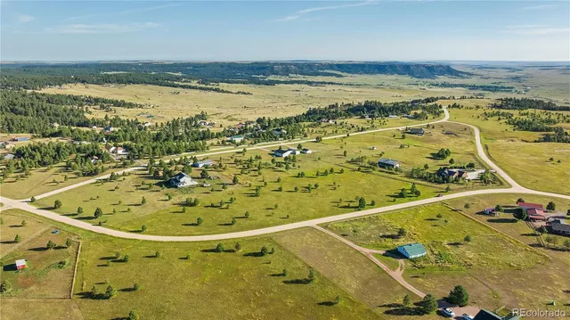 a view of a bathroom with a sink and a window