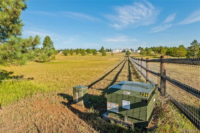 a view of a balcony with ocean view