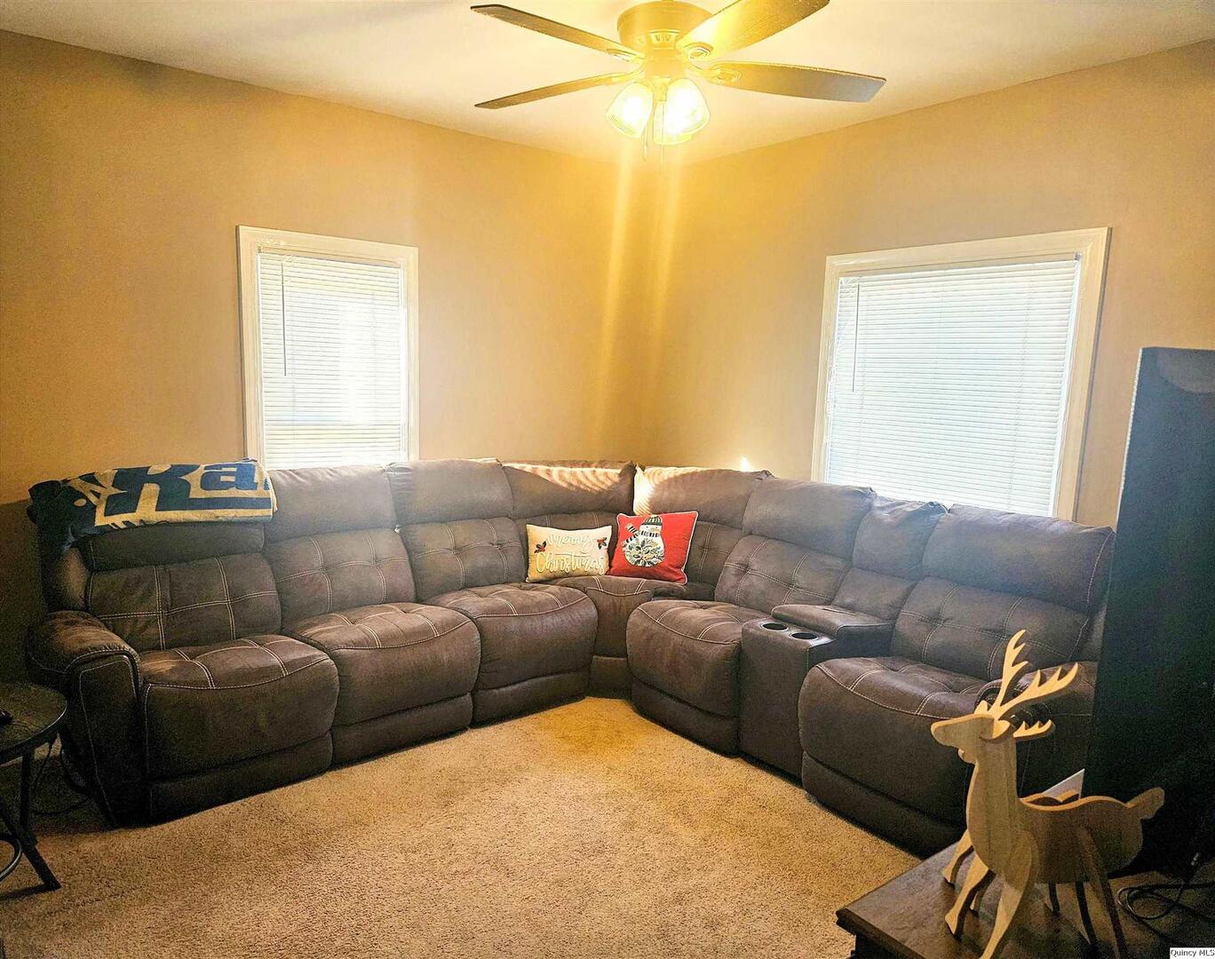 1520 Spruce Street Quincy, IL 62301 - Photo 4 of 21 a living room with furniture and a window