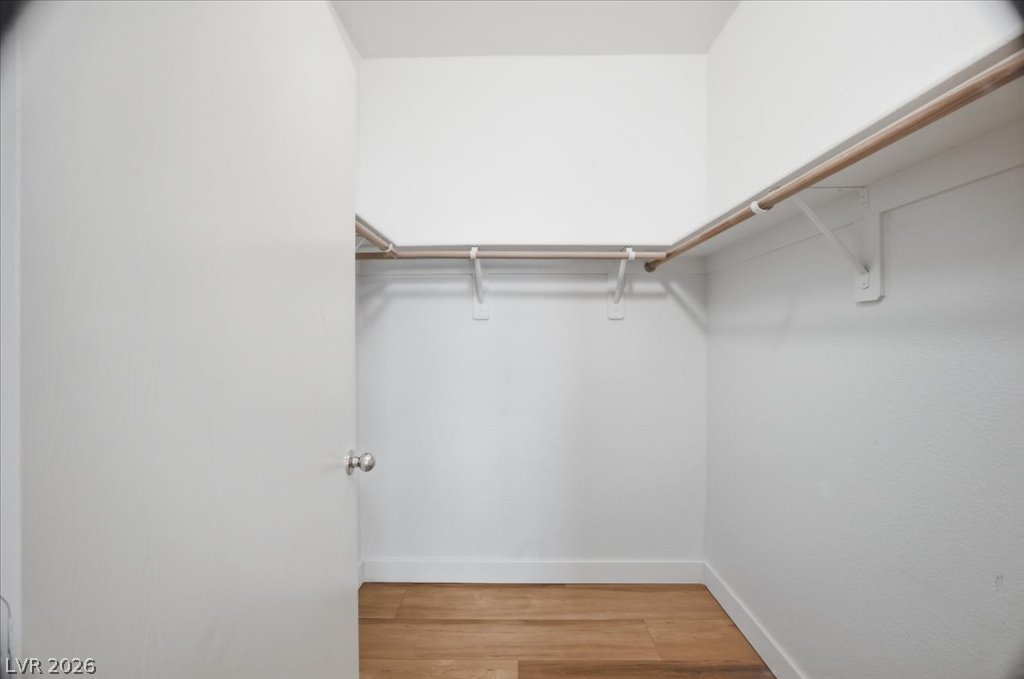 9050 West Warm Springs Road, Unit 1033 Las Vegas, NV 89148 - Photo 11 of 26 Ample hanging space and durable flooring await your wardrobe in this dedicated closet.