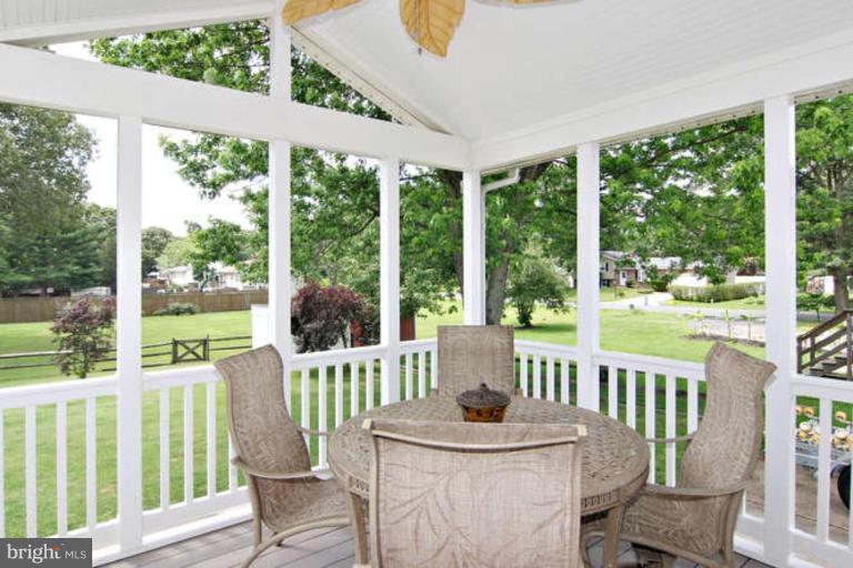 801 Elmhurst Road Severn, MD 21144 - Photo 14 of 21 Enclosed rear porch with Cathedral ceiling & fan