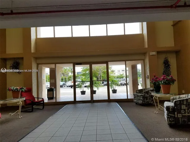 a view of a porch with furniture and a porch