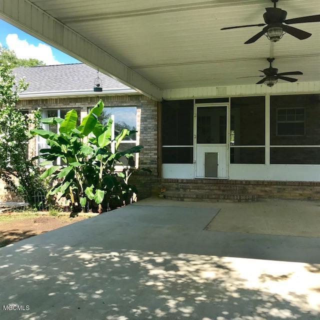 20706 Mennonite Road Gulfport, MS 39503 - Photo 35 of 55 Patio and Screened Porch