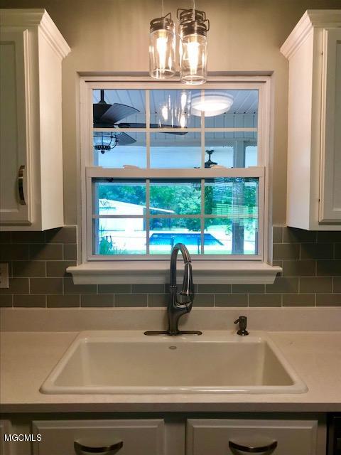 20706 Mennonite Road Gulfport, MS 39503 - Photo 7 of 55 Kitchen looking over Pool