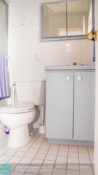 3322 Coolidge Street Hollywood, FL 33021 - Photo 11 of 32 a bathroom with a toilet and a sink