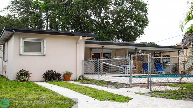 3322 Coolidge Street Hollywood, FL 33021 - Photo 2 of 32 a view of a house with backyard and porch