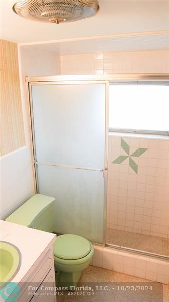 3322 Coolidge Street Hollywood, FL 33021 - Photo 23 of 32 a bathroom with a sink and a toilet