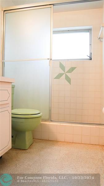 3322 Coolidge Street Hollywood, FL 33021 - Photo 24 of 32 a bathroom with a toilet and a shower