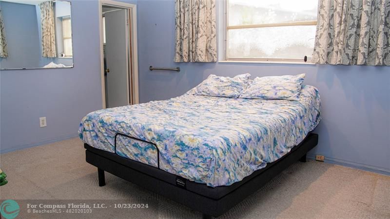 3322 Coolidge Street Hollywood, FL 33021 - Photo 10 of 32 a bedroom with a bed and window