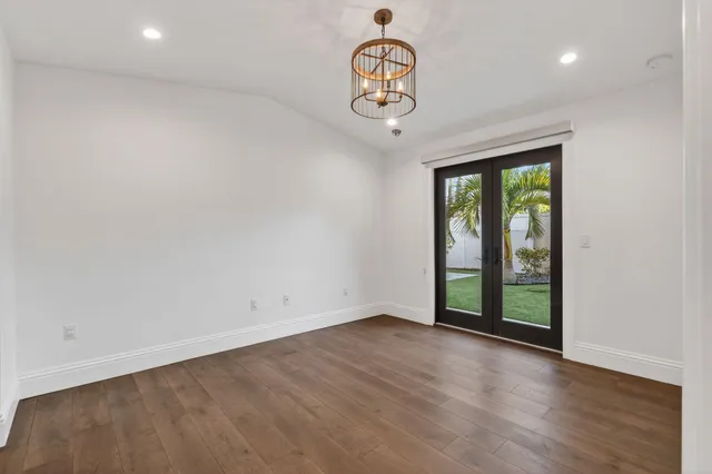a utility room with washing machine