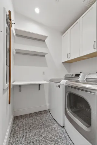 a swimming pool with outdoor seating and yard