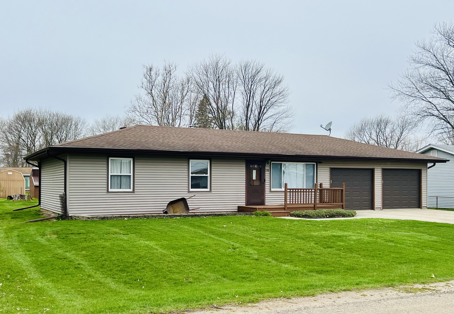 316 Erickson Road Rochelle, IL 61068 - Photo 1 of 17 a house view with a garden space