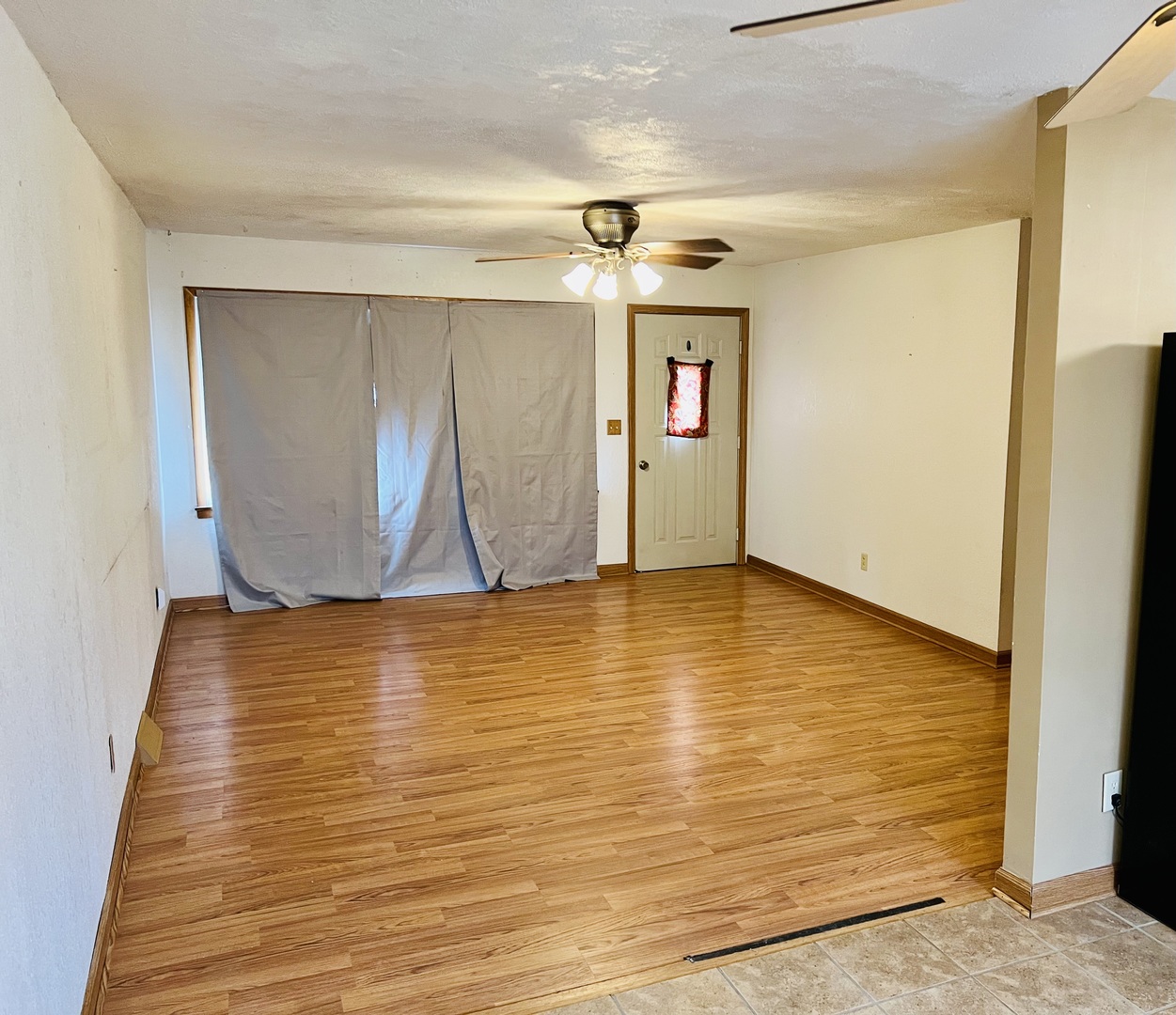 316 Erickson Road Rochelle, IL 61068 - Photo 4 of 17 a view of room and empty room with wooden floor