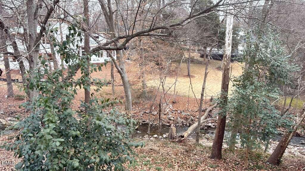 4212 Converse Drive Raleigh, NC 27609 - Photo 23 of 32 a view of trees and covered with tall trees