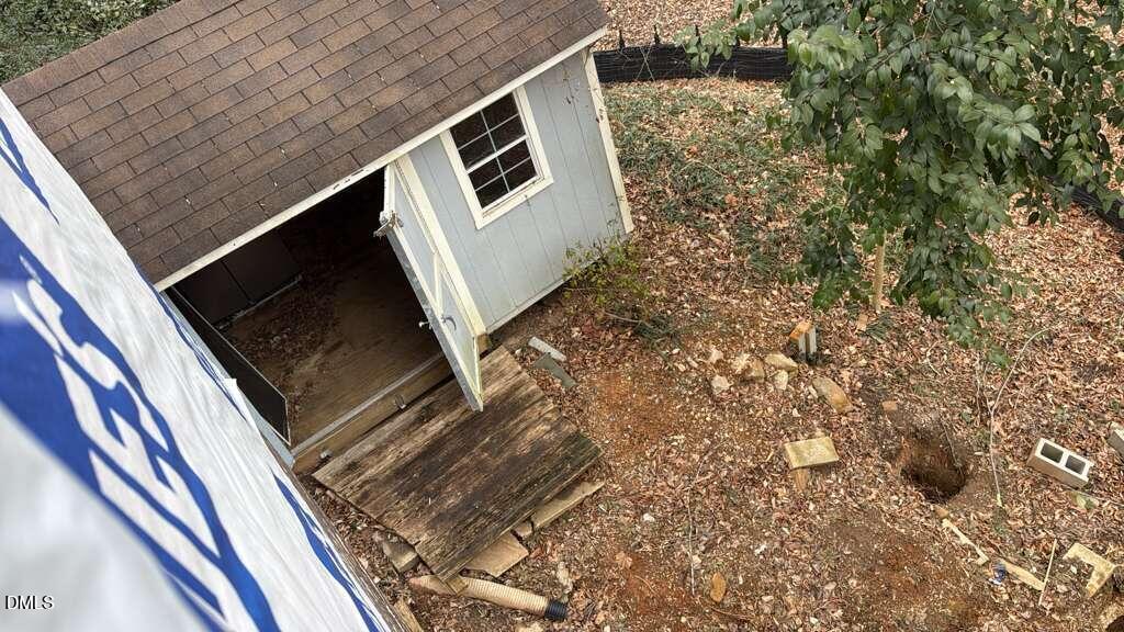 4212 Converse Drive Raleigh, NC 27609 - Photo 30 of 32 a microwave oven on a brick wall