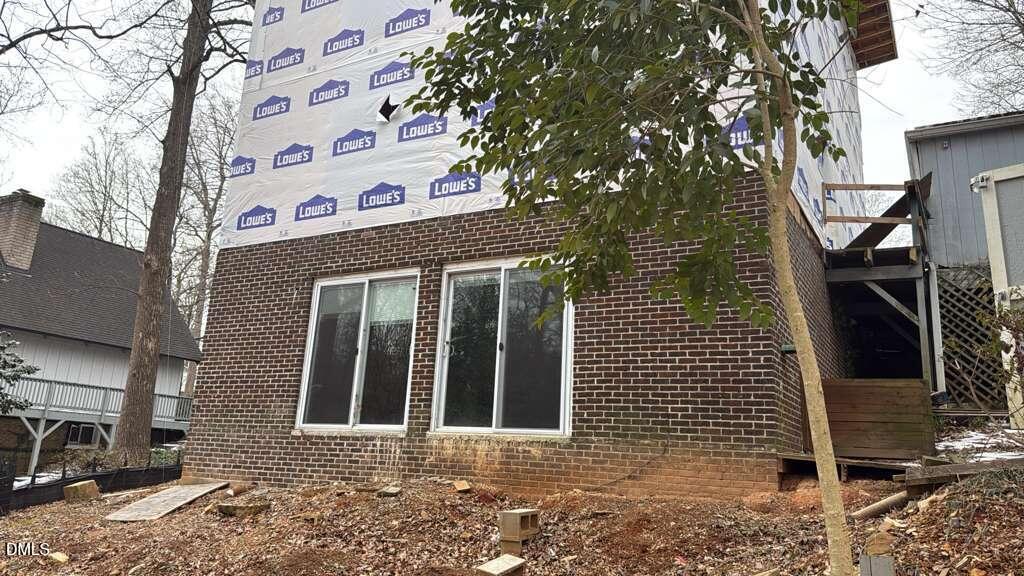 4212 Converse Drive Raleigh, NC 27609 - Photo 31 of 32 a front view of a building with parking space