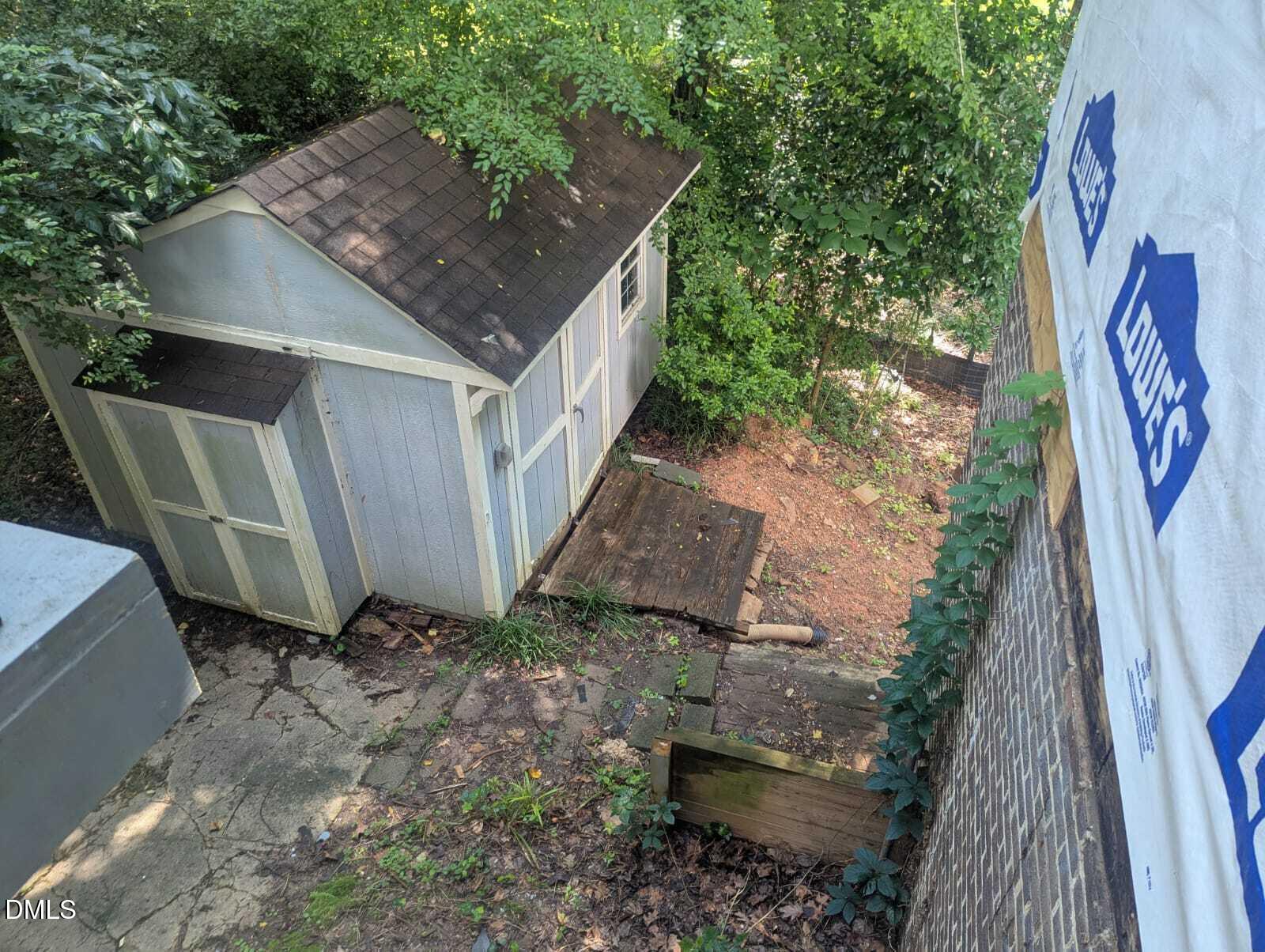 4212 Converse Drive Raleigh, NC 27609 - Photo 5 of 32 a backyard of a house