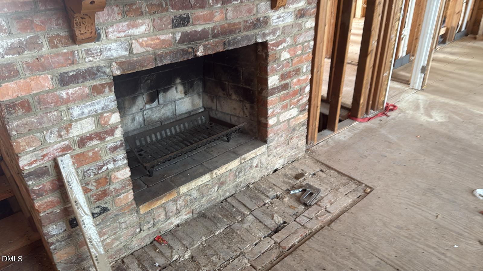 4212 Converse Drive Raleigh, NC 27609 - Photo 8 of 32 a living room with a fireplace