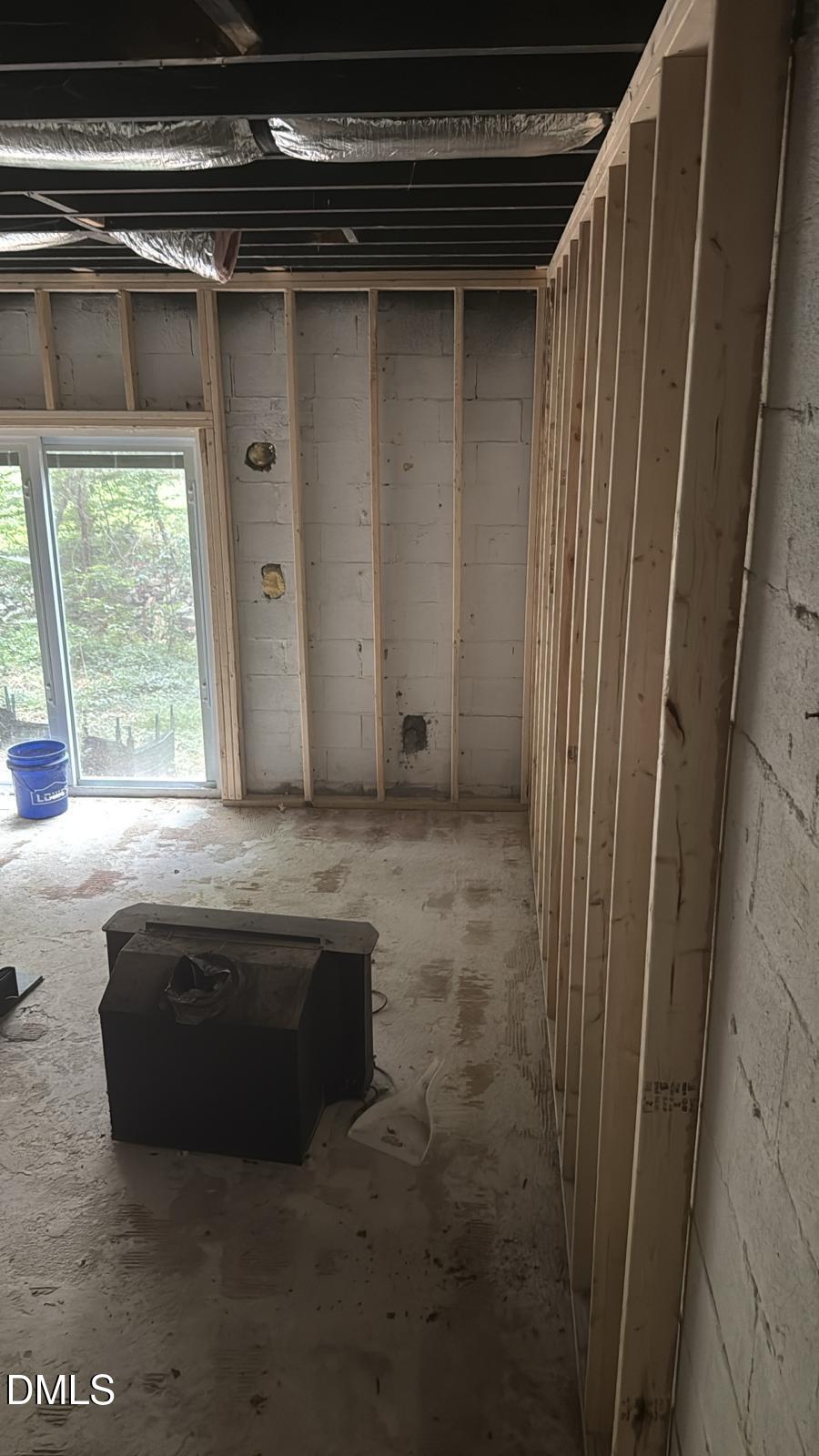 4212 Converse Drive Raleigh, NC 27609 - Photo 10 of 32 a living room with a sink and a mirror