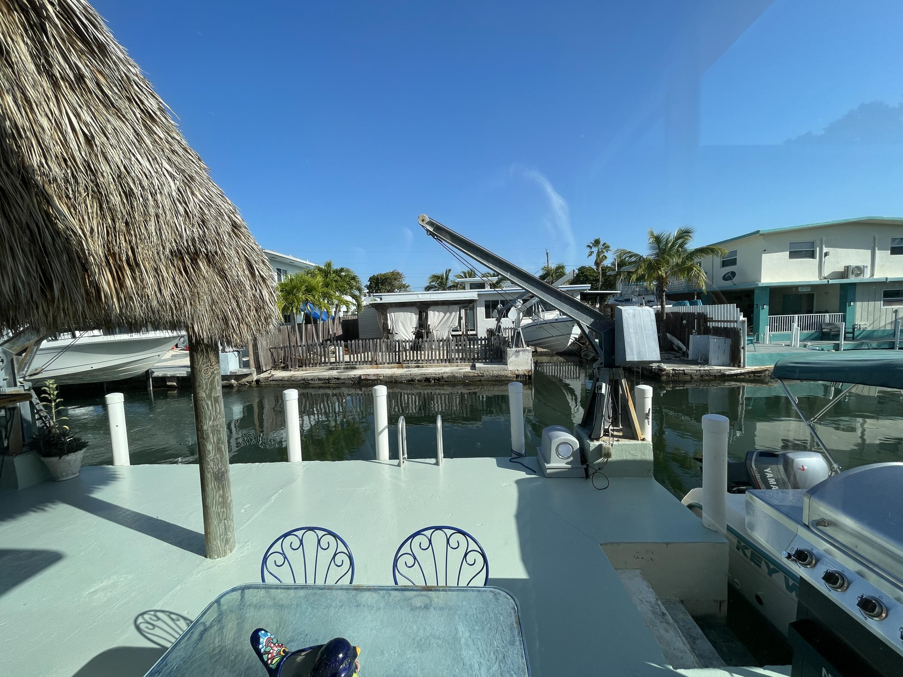 64 Seagate Boulevard Key Largo, FL 33037 - Photo 28 of 44 back patio Davits