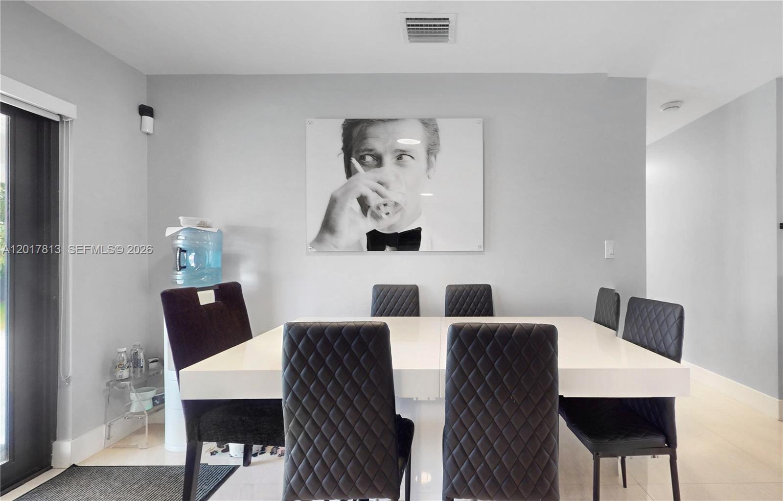 12535 Southwest 31st Terrace Miami, FL 33175 - Photo 12 of 32 a view of a dining room with furniture