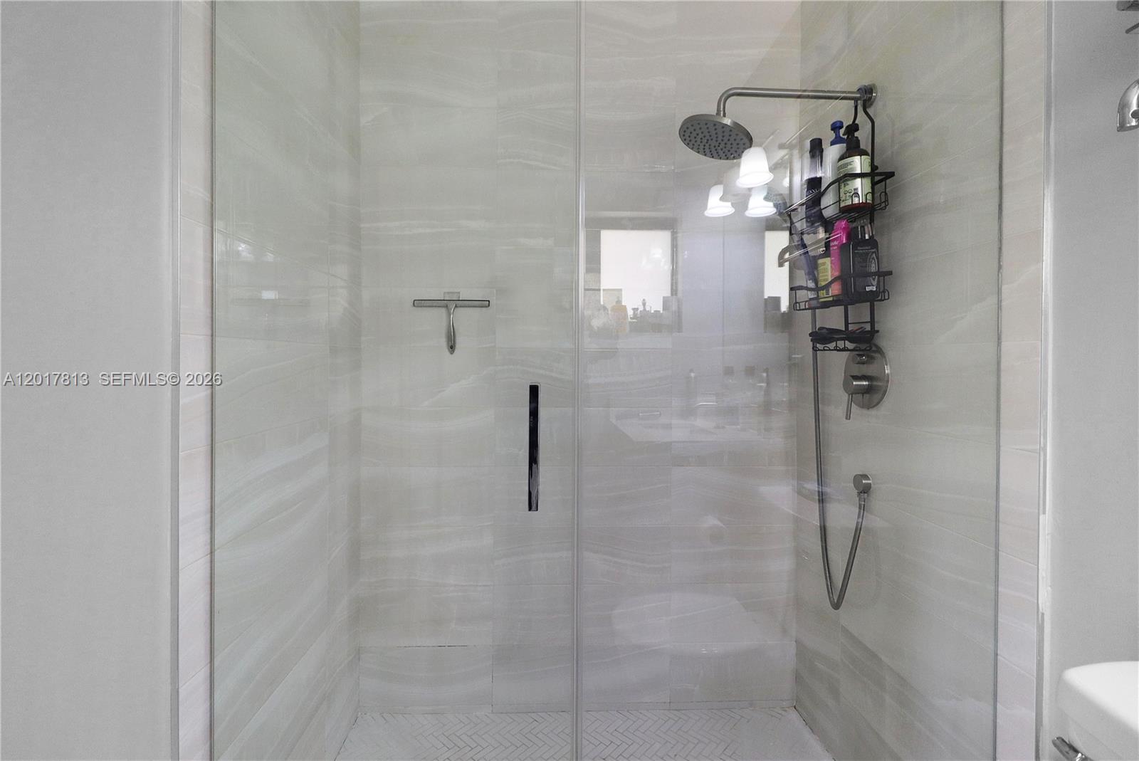 12535 Southwest 31st Terrace Miami, FL 33175 - Photo 17 of 32 a bathroom with a shower
