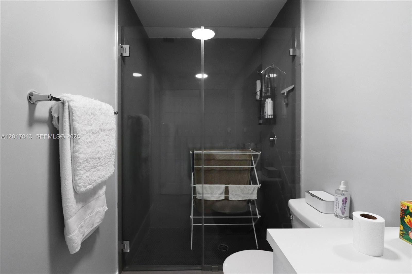 12535 Southwest 31st Terrace Miami, FL 33175 - Photo 21 of 32 a bathroom with a toilet sink and shower