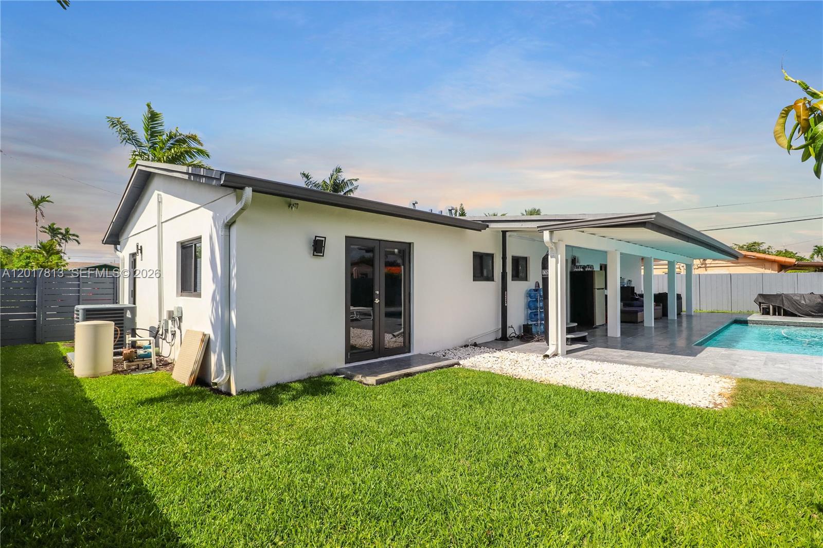 12535 Southwest 31st Terrace Miami, FL 33175 - Photo 28 of 32 a view of a house with a yard and sitting area