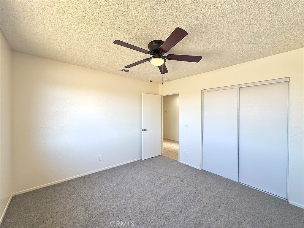 22311 Thunderbird Road Apple Valley, CA 92307 - Photo 16 of 18 a view of an empty room