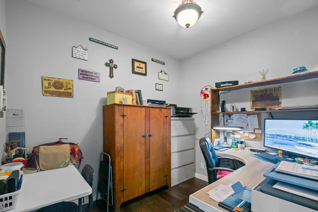 a bedroom with a bed and a bookshelf