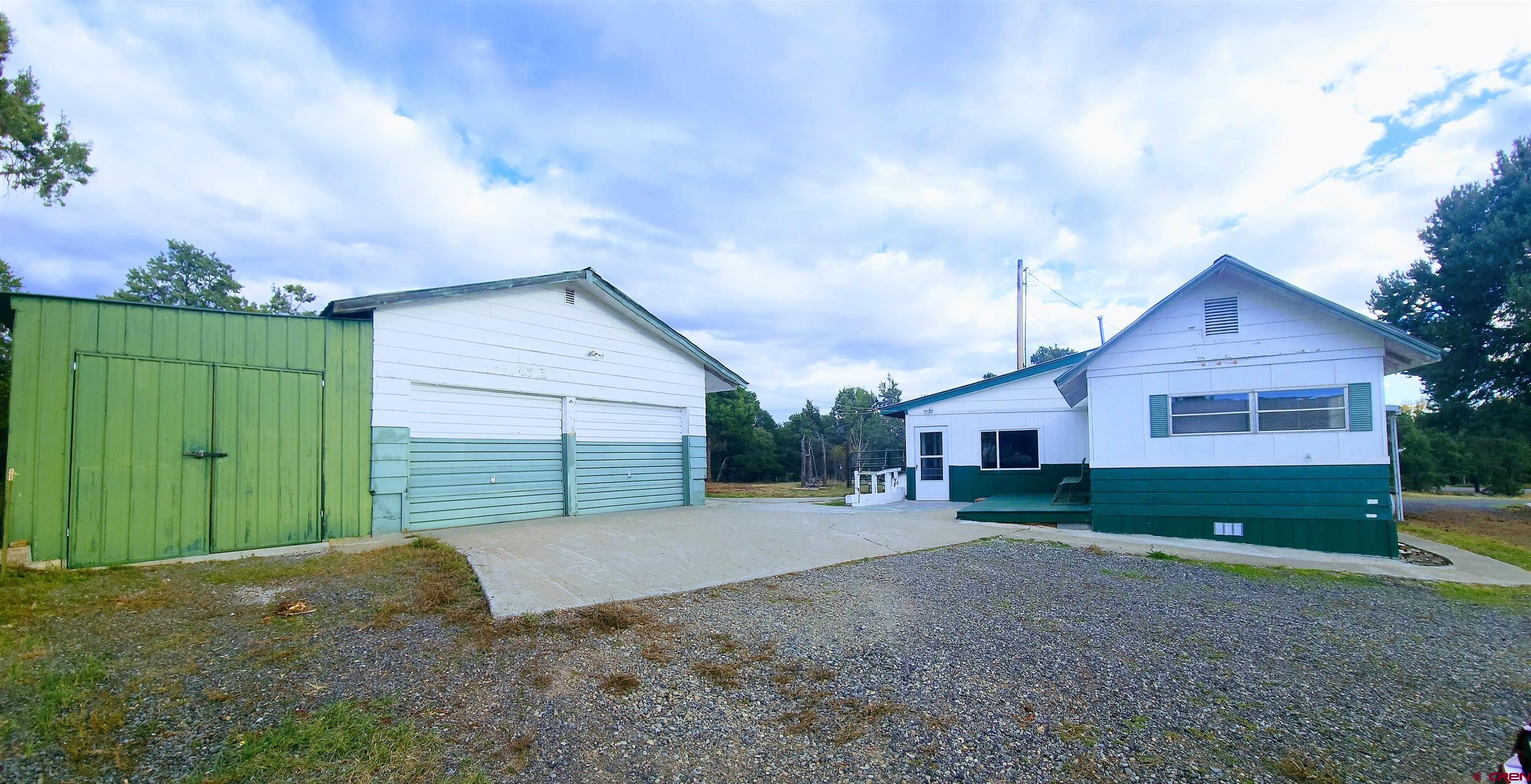 24593 Timothy Road Cedaredge, CO 81413 - Photo 6 of 33 a view of a backyard of the house