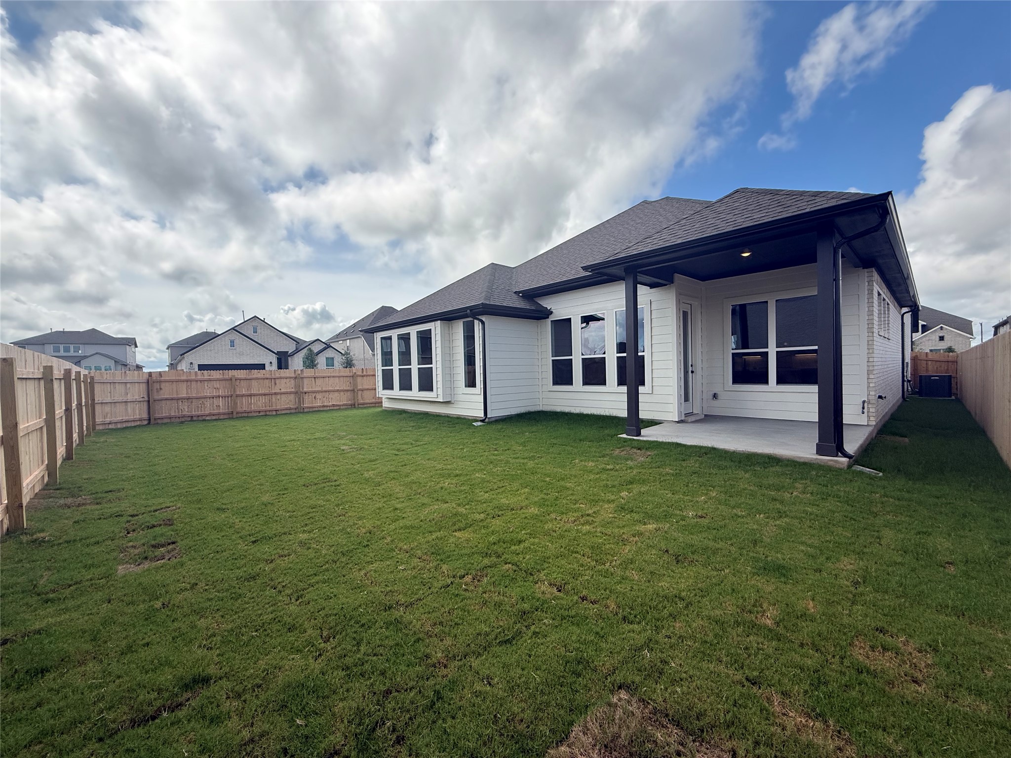 17336 Graces Path Pflugerville, TX 78660 - Photo 5 of 11 a view of a house with a backyard
