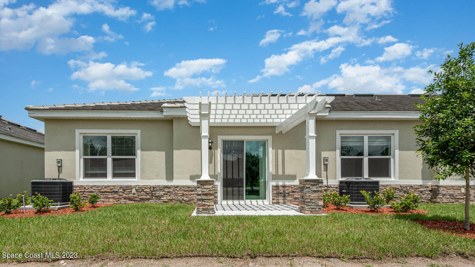 3336 Morrow Place Mims, FL 32754 - Photo 16 of 36 front view of a house with a yard