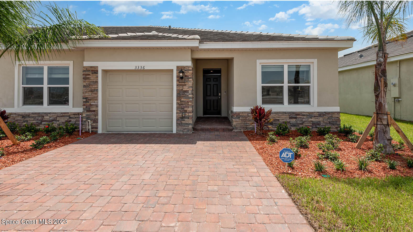 3336 Morrow Place Mims, FL 32754 - Photo 5 of 36 a front view of a house with a yard